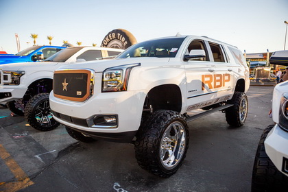 GMC Denali with RBP STEALTH POWER RUNNING BOARDS